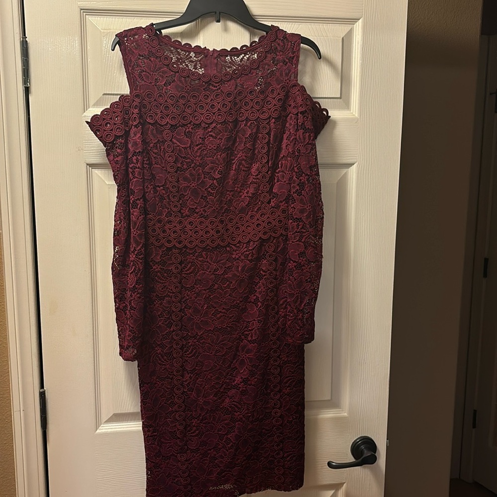 Bare shoulder knee length burgundy dress